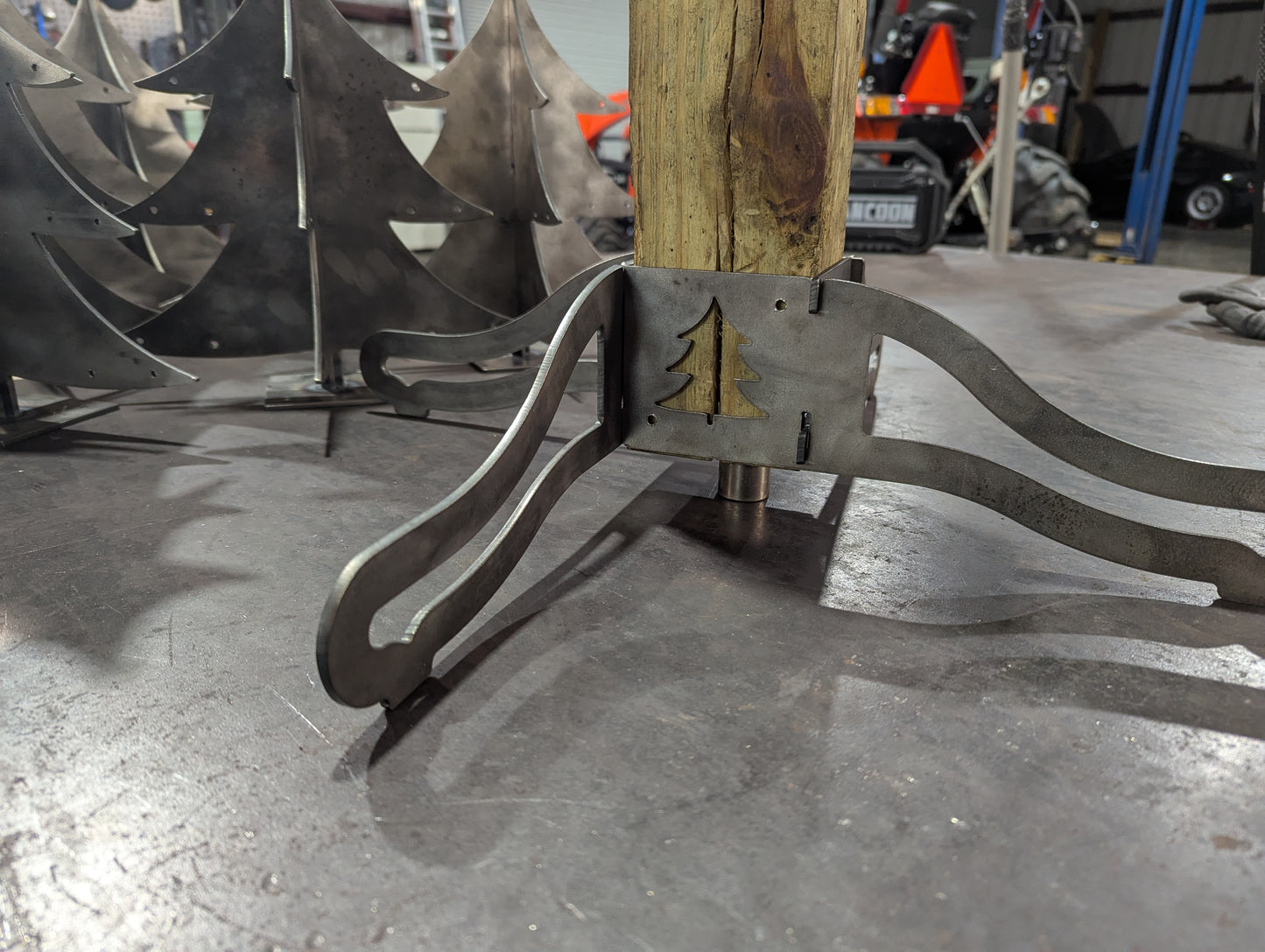 Base Brackets assembled with 4x4 Post inserted into Brackets with Ornamental Christmas tree cutout.