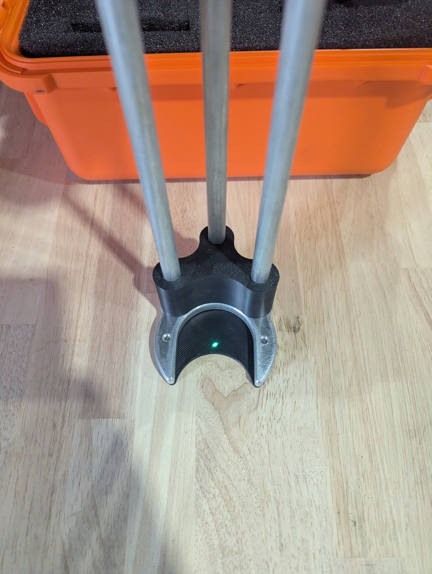 Shields Dead Center Jig with laser plummet shown centered on the jig.